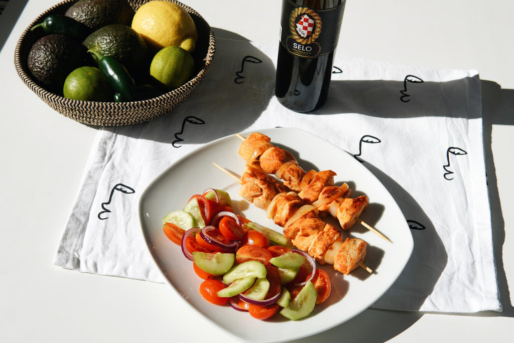 Grilled Meat Skewers (Ražnjići) with Cucumber and Tomato Salad